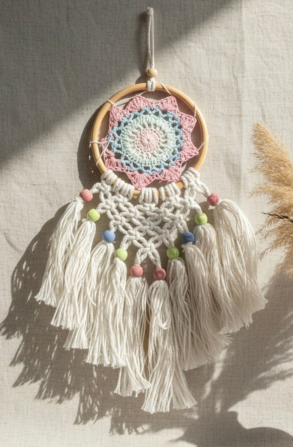 Dreamcatcher with colorful beads and tassels on a neutral background