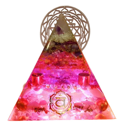Triangular pyramid with pink and red lights and crystals on a white background
