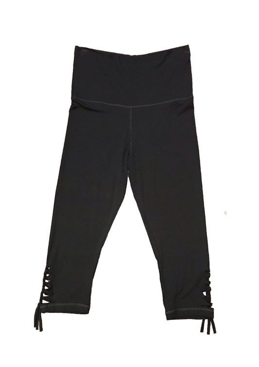 Black leggings with hem detail and buttons.