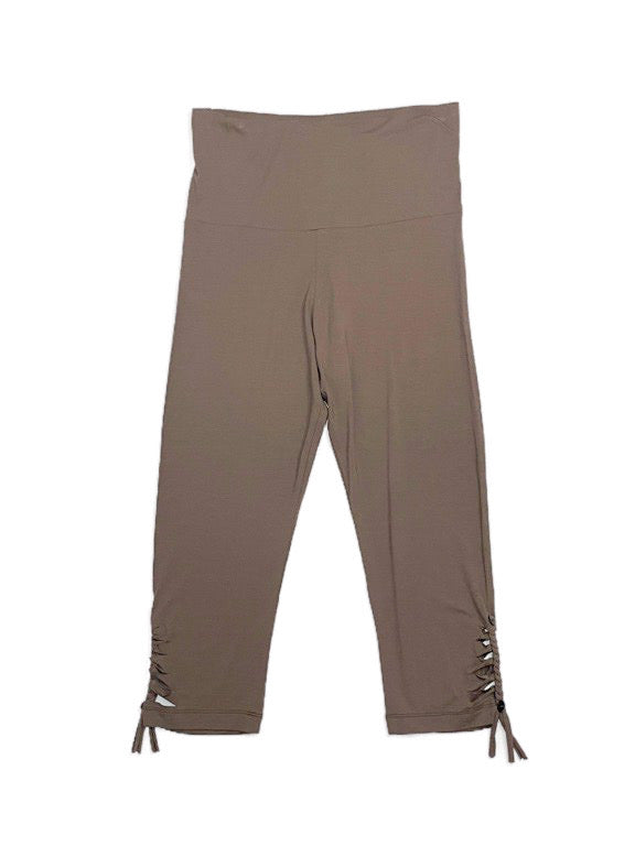 3/4 brown leggings with Hem detail and buttons.
